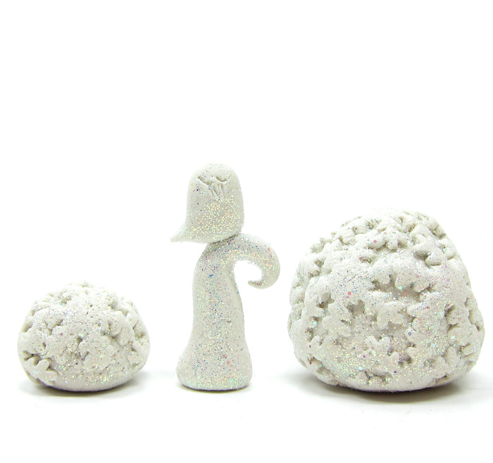 Polymer clay owl figurine with snowflake bushes