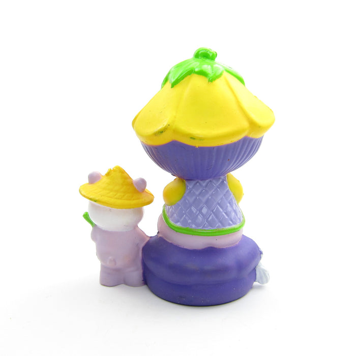 Almond Tea with Marza Panda sitting on a cushion miniature figurine