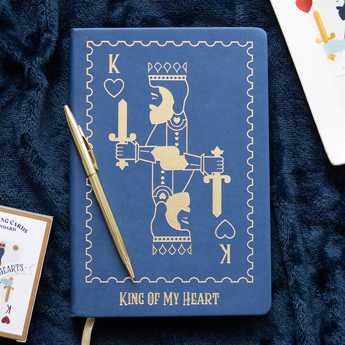king of my heart playing card notebook styled in home setting with regal design