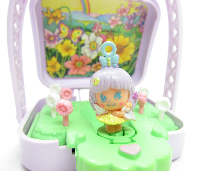 Charmkins Primrose Fairy in Magic Garden Pocket Pops case