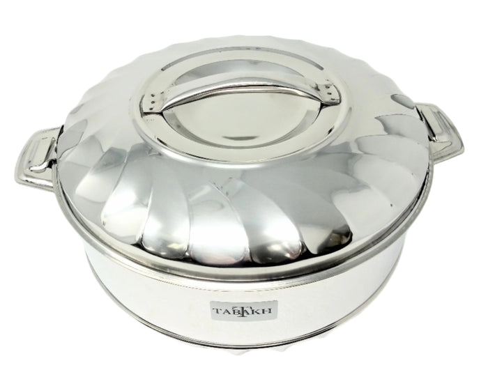 Stainless steel pot with lid on a white background